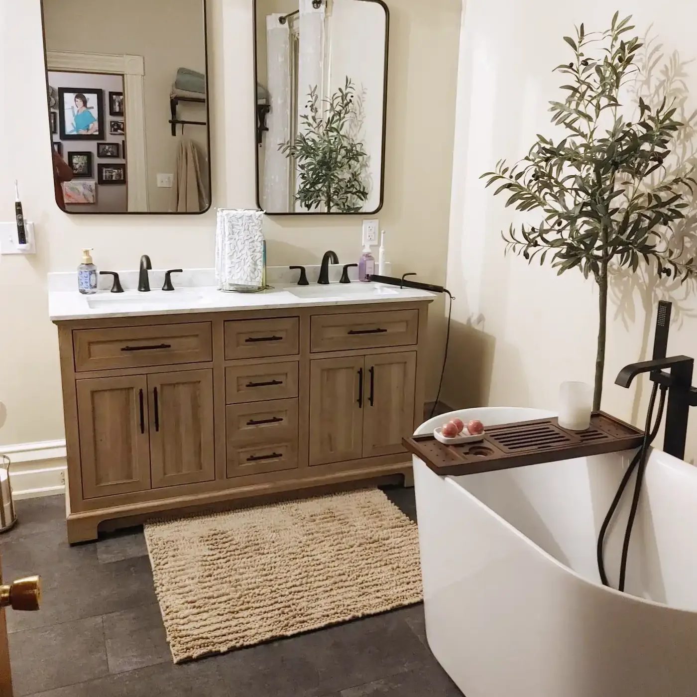 a remodeled bathroom with full tub.