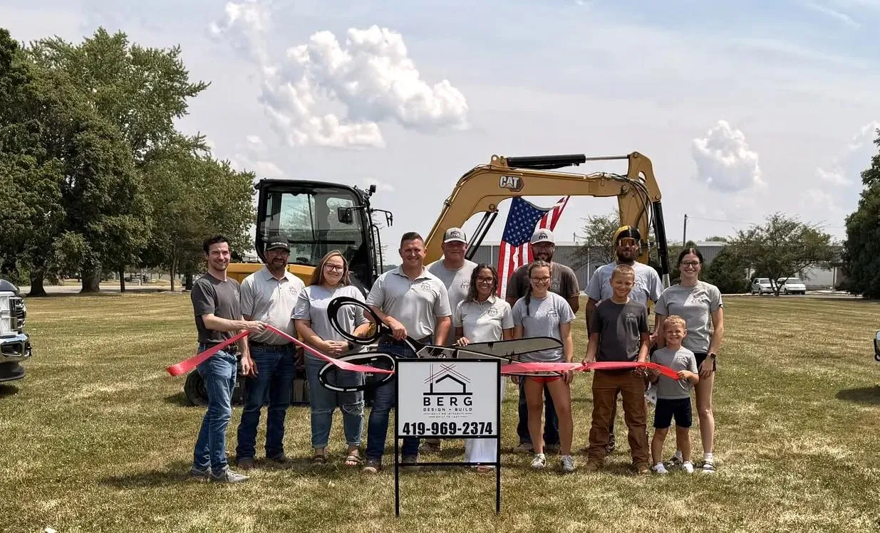 the Berg Design + Build team cutting the ribbon