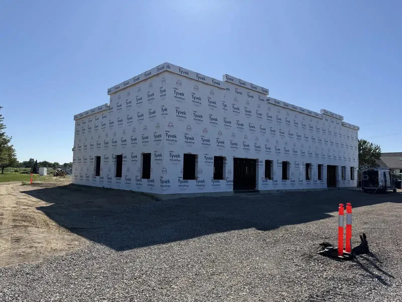 view of other side of building with wrap