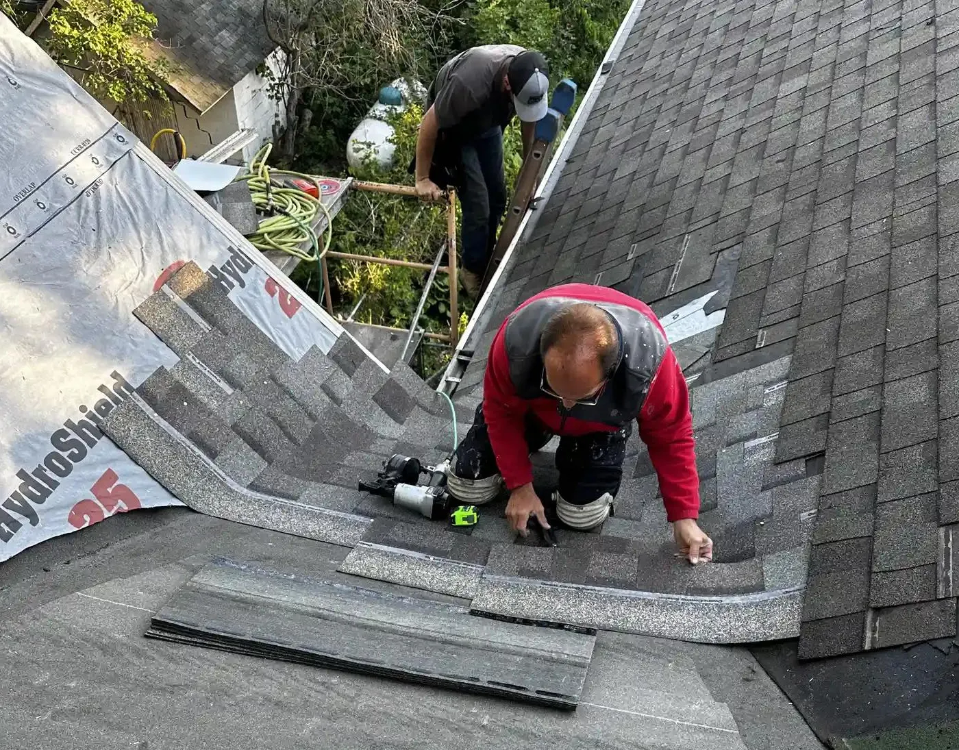 workers repairing a roof