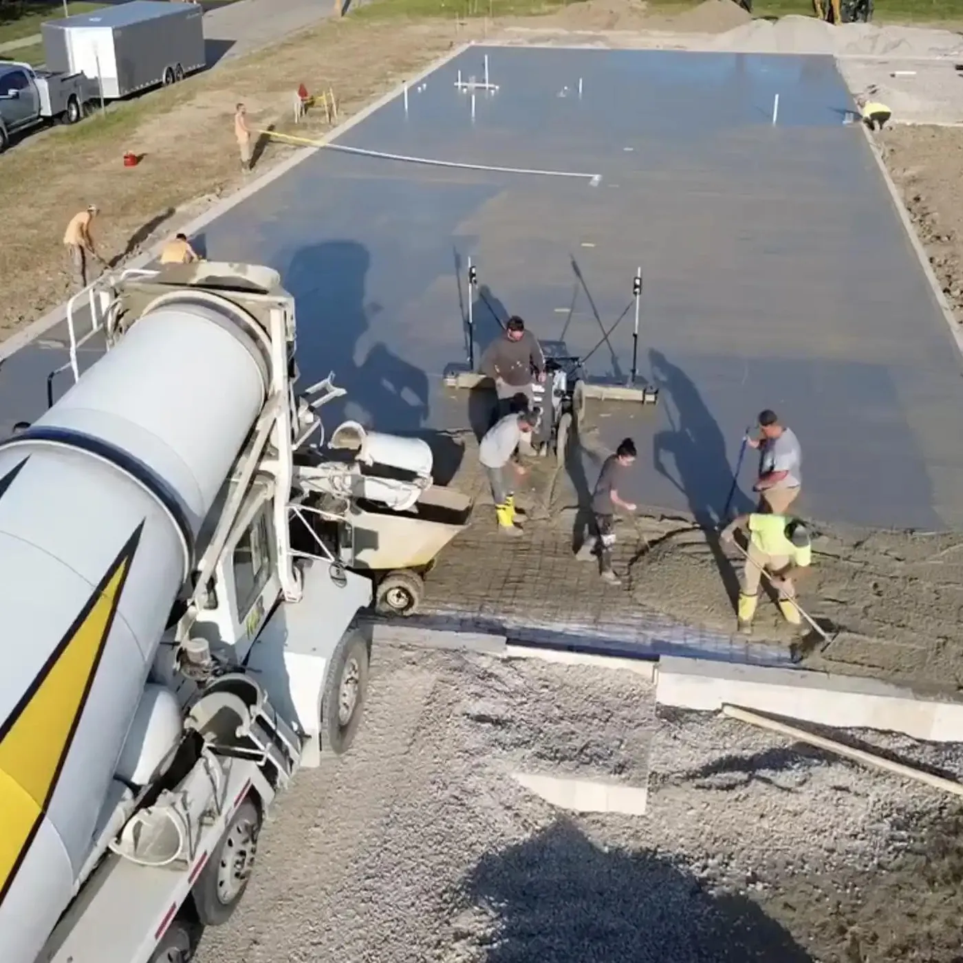 general contracting crew pouring cement